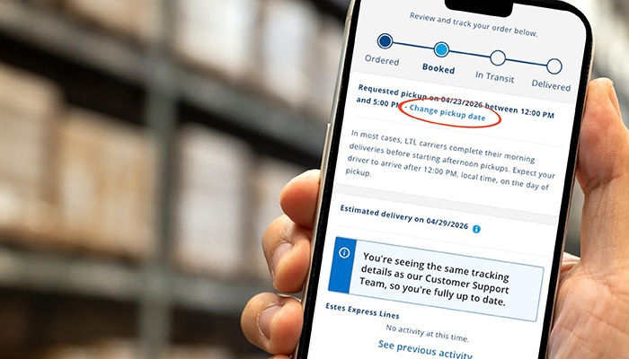Close up of a cellphone with the Freightquote request a quote